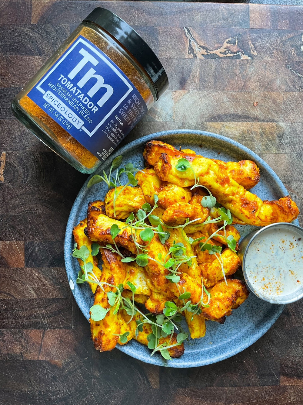 Bowl of Air Fried Halloumi Fries seasoned with Spiceology's Tomatador blend