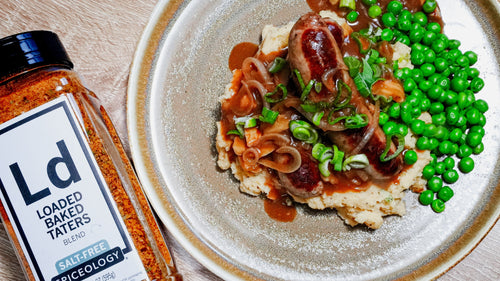 Loaded Baked Tater Irish Bangers and Champ with Onion Gravy