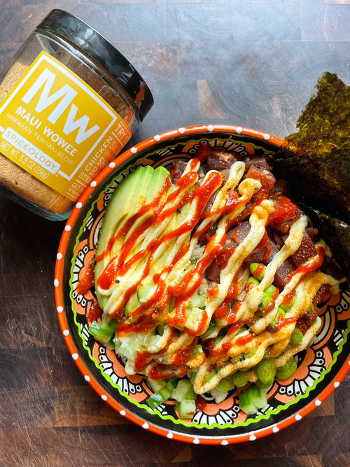 Finished Pokè Bowl next to a jar of Spiceology Maui Wowee seasoning