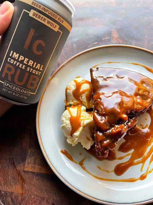 Plated slice of Sticky Toffee Pudding next to a can of Spiceology  Imperial Coffee Stout rub