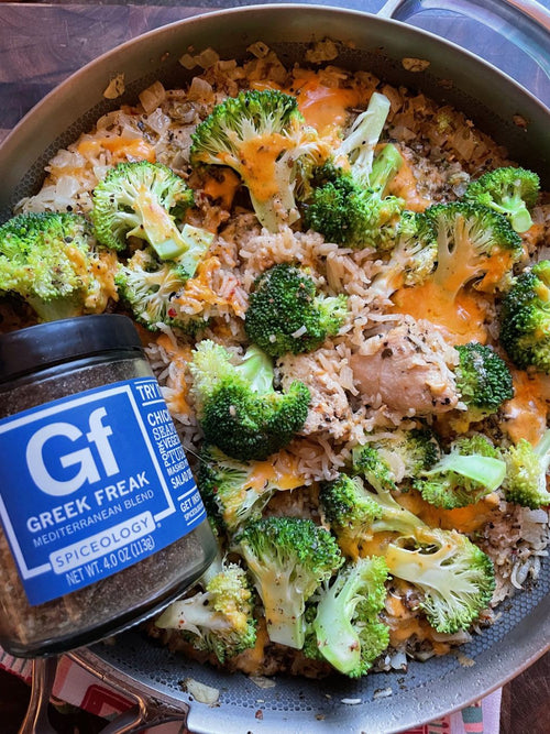 One-pan Greek Freak cheesy chicken broccoli and rice dish with melted cheese on top