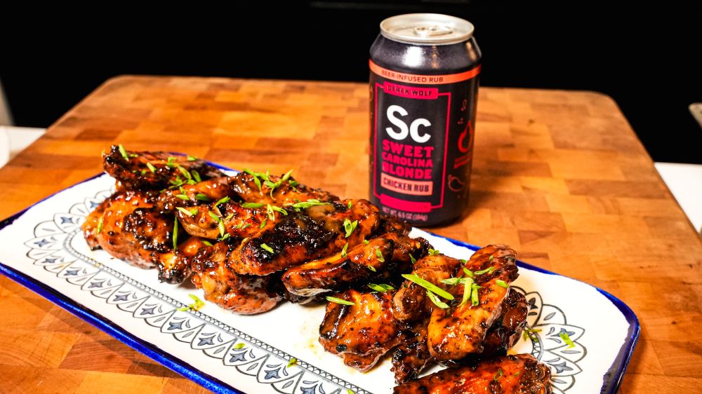 Plated drumettes next to a can of Sweet Carolina Blonde  bbq rub