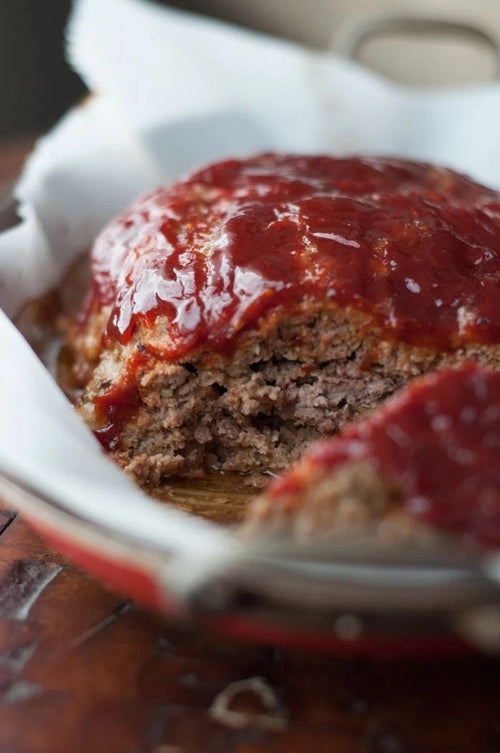 Sliced meatloaf in a pan