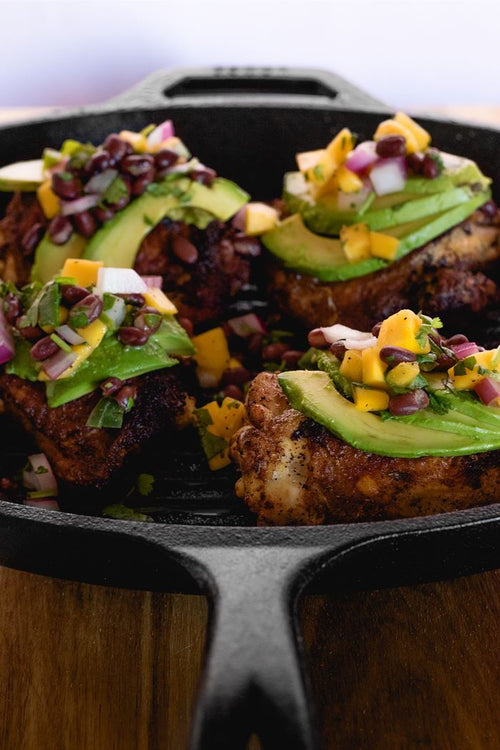 Jamaican Jerk Chicken in a cast iron pan