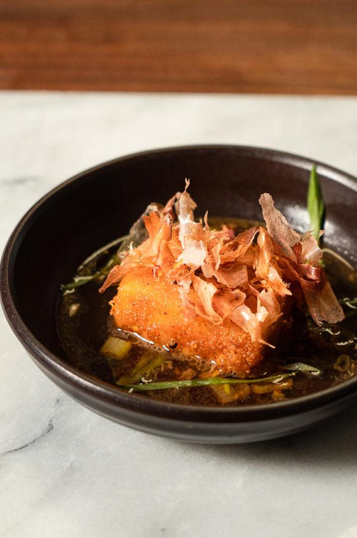 Agedashi tofu in a bowl with broth