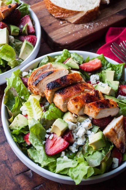 Spicy Chicken strawberry salad in a bowl