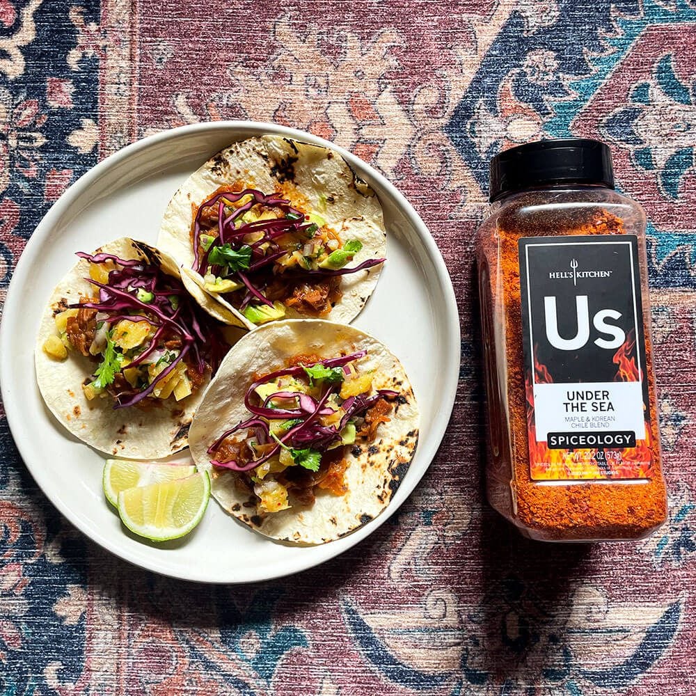 under the sea jackfruit tacos with pineapple salsa on a white plate