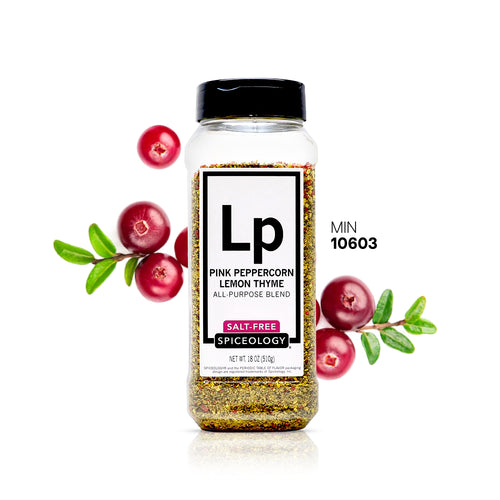 Spiceology Pink Peppercorn Lemon Thyme spice jar with red berries and green herb sprigs on a white background