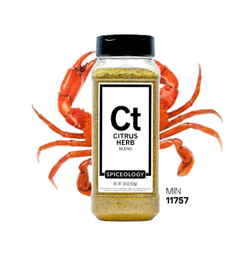 Spiceology Citrus Herb jar in front of an orange crab on a white background