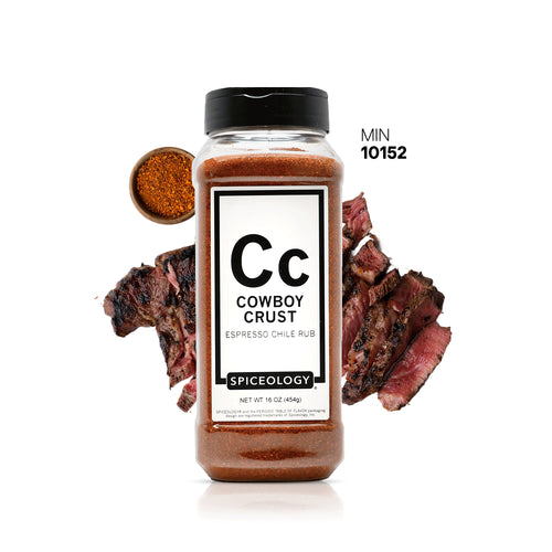 Spiceology Cowboy Crust jar with dark braised beef pieces on a white background