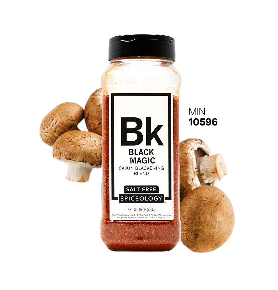 Spiceology Black Magic jar with brown mushrooms on a white background