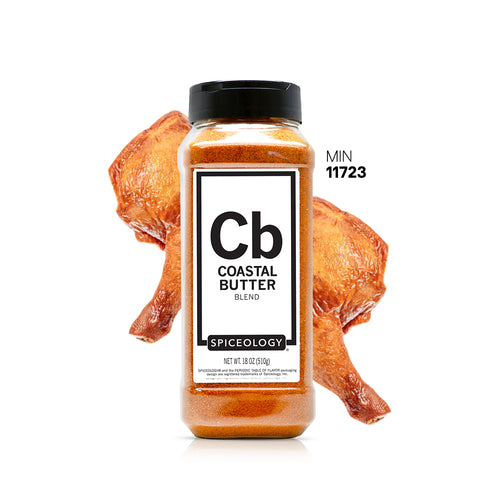 Spiceology Coastal Butter jar with golden chicken wings on a white background