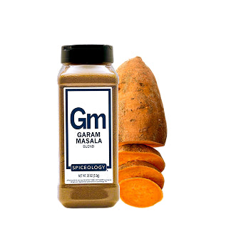 Spiceology Garam Masala spice jar with an orange sweet potato on a white background