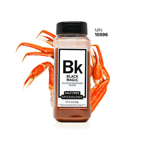 Spiceology Black Magic jar with an orange crab claw on a white background
