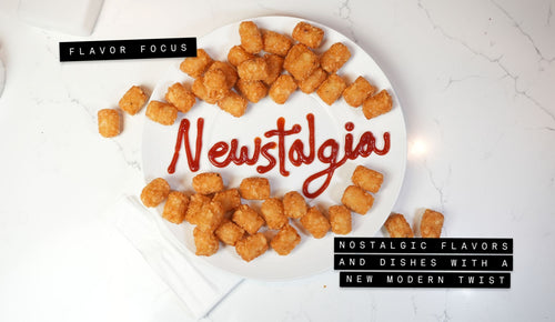Plate of golden tater tots arranged around the word Newstalgia written in ketchup with Flavor Focus and Nostalgic Flavors and Dishes with a New Modern Twist text labels on a white marble background