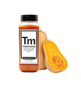 Spiceology Turmeric jar with a halved butternut squash on a white background