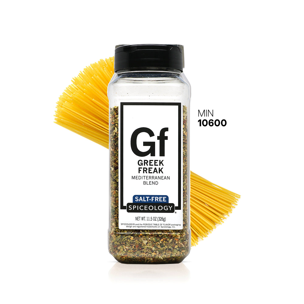 Spiceology Greek Freak jar with yellow pasta noodles on a white background