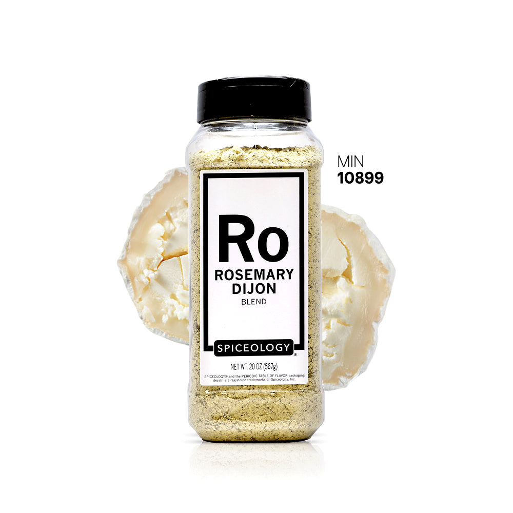 Spiceology Rosemary Dijon jar with a garlic bulb on a white background