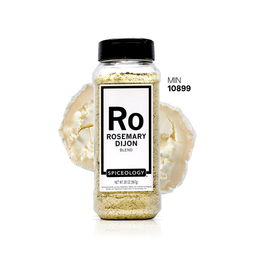 Spiceology Rosemary Dijon jar with a garlic bulb on a white background