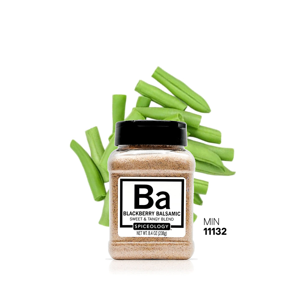 Spiceology Blackberry Balsamic spice jar with green celery stalks on a white background