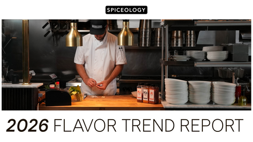 Spiceology 2026 Flavor Trend Report cover with a chef in a kitchen setting.