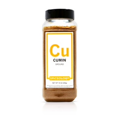 Jar of Spiceology ground cumin on a white background