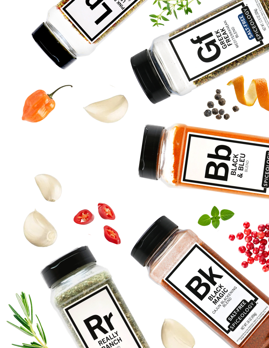 Collection of seasoning bottles with visible labels and ingredients on a white background