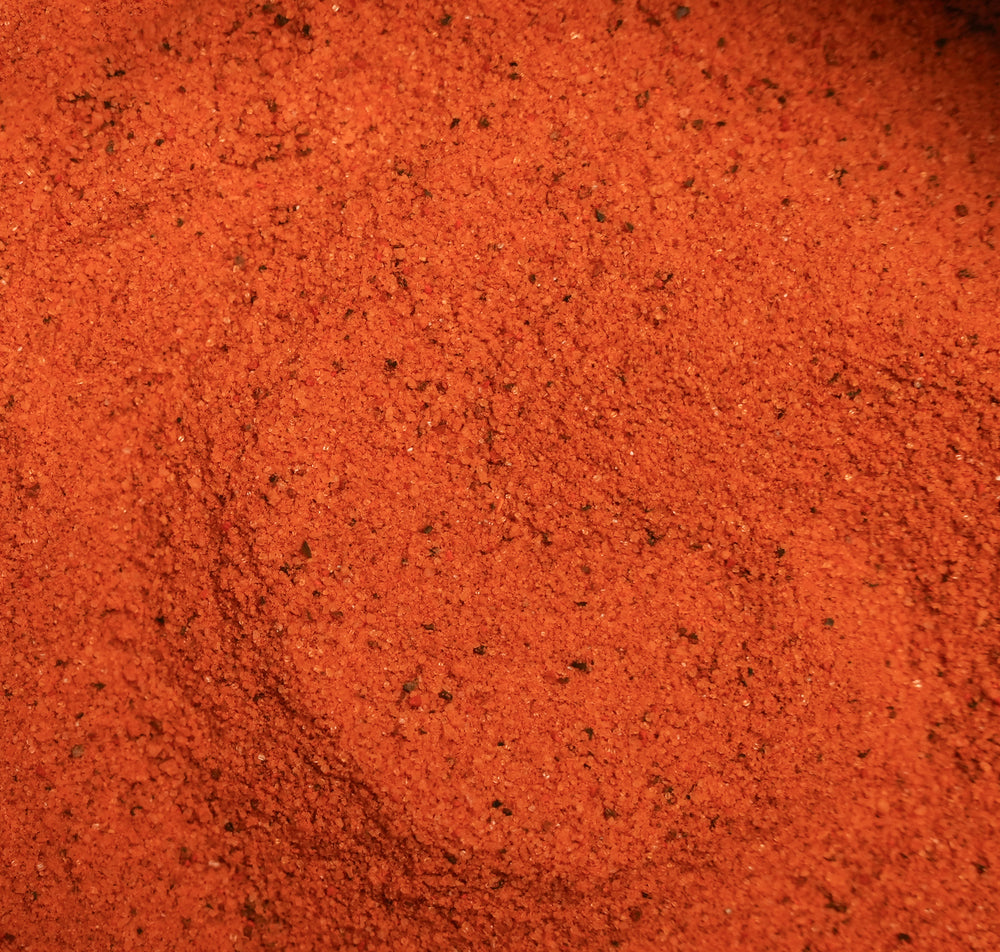 Close-up of a textured red-brown surface