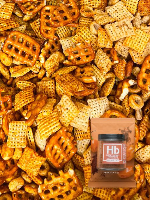 Fresh assorted nuts and dried fruit trail mix in wooden bowl, healthy snack blend with almonds, walnuts and cranberries