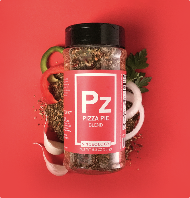 Spice container labeled 'Pizza Pie Blend' by Spiceology on a red background