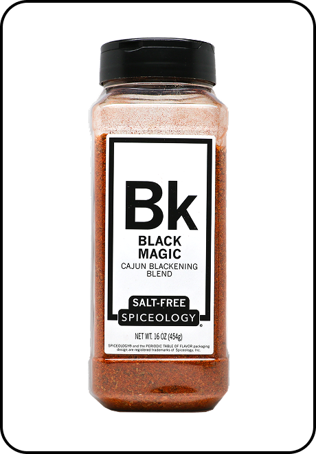Spice container labeled 'Black Magic Salt-Free' by Spiceology on a white background