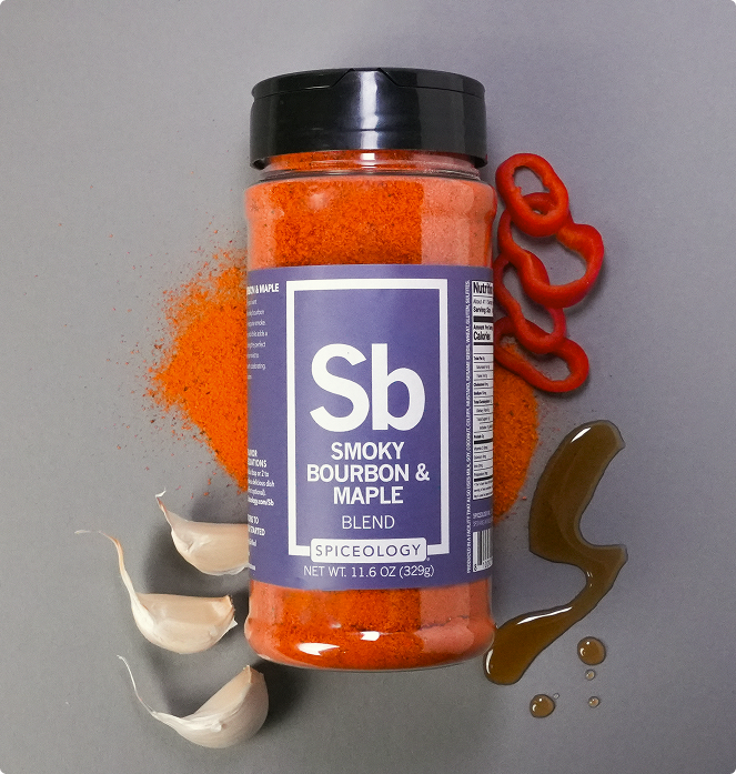 Spice bottle labeled Spiceology Smoky Bourbon & Maple with decorative elements on a gray background