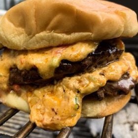 Pimento double-cheese burger with melting cheese