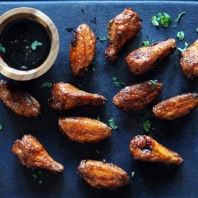 Christie Vanover chicken wings on a platter with dipping sauce