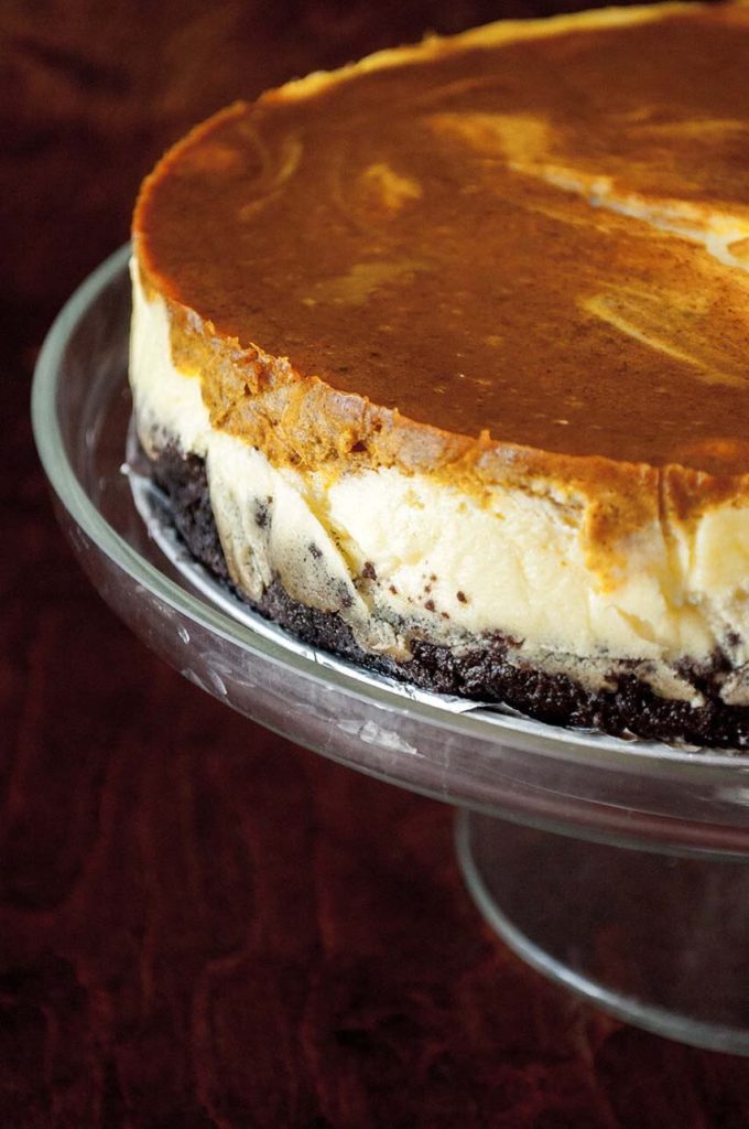 Pumpkin ricotta cheesecake recipe on cake stand