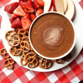 S'mores hummus with strawberries, apples, and pretzels