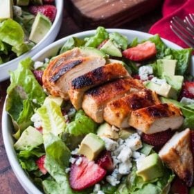 Spicy Chicken strawberry salad in a bowl