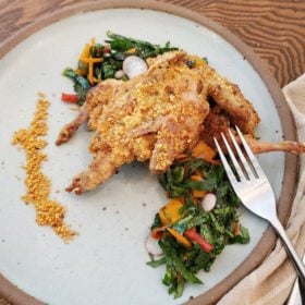 Spicy Peanut Crusted Quail with Collard Green Salad