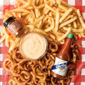 Vegan fry sauce with regular fries and curly fries
