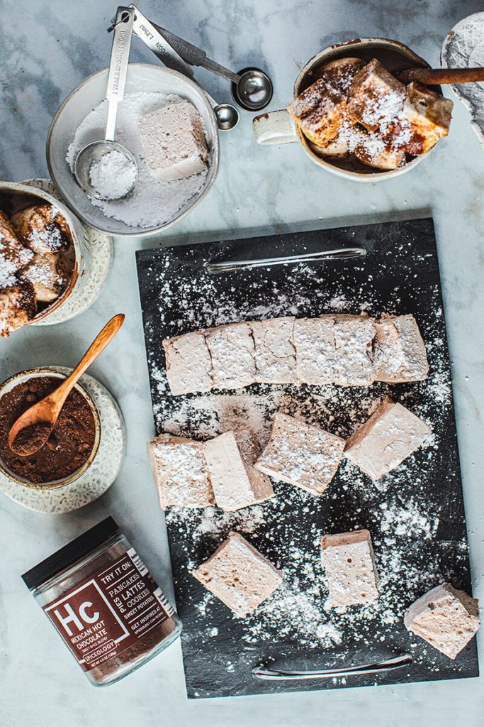 Mexican hot chocolate marshmallows on food tray with spice jar