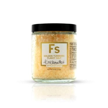 Golden Turmeric Flakey Salt in a glass jar