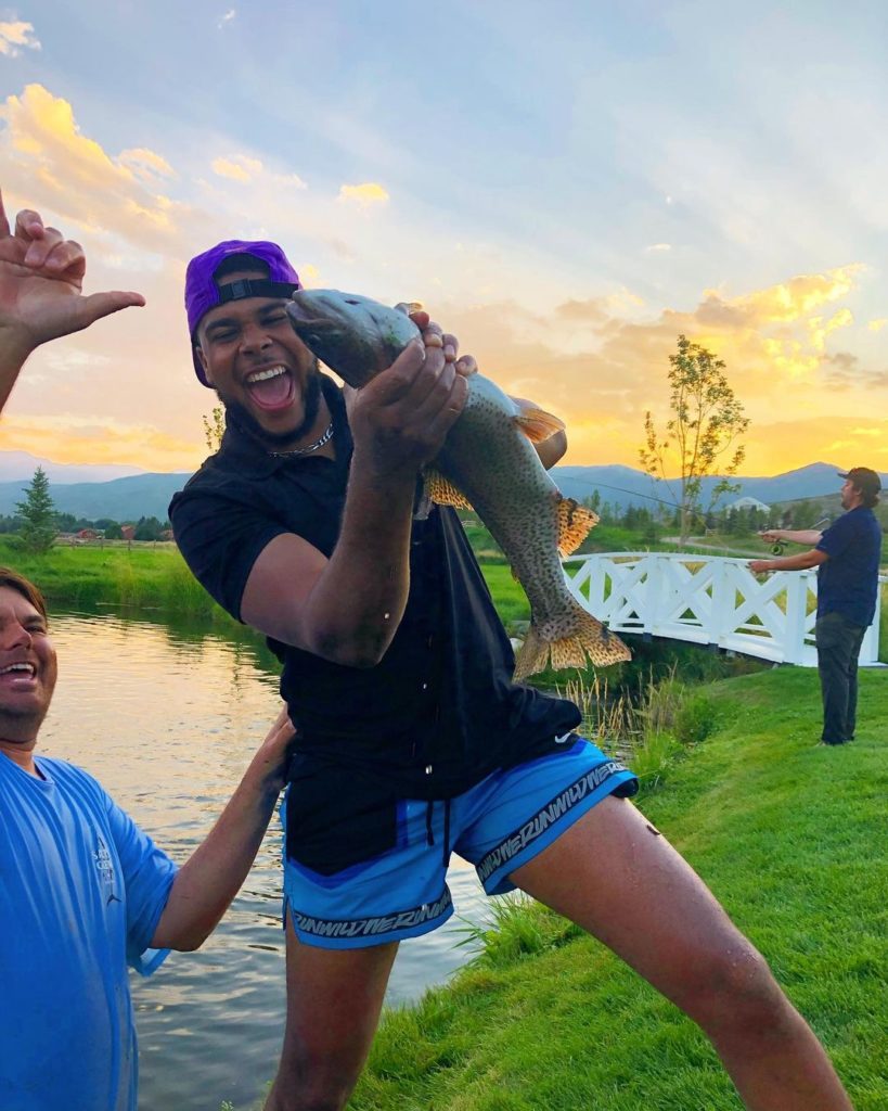 Justin Robinson holding a fish