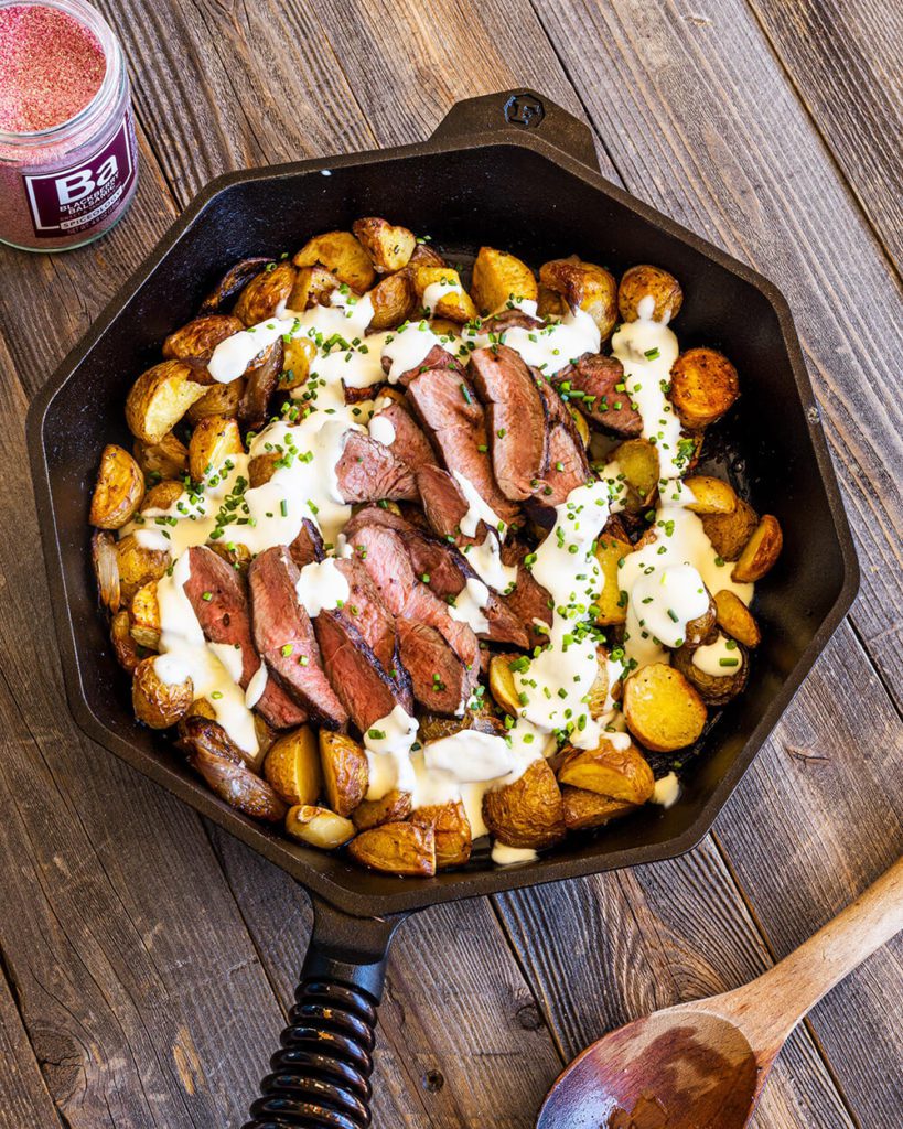 Blackberry Balsamic lamb skillet with potatoes in cast iron skillet