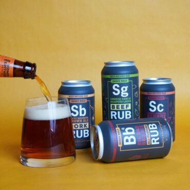 Derek Wolf Beer-Infused Spice Rub 4-Pack next to beer